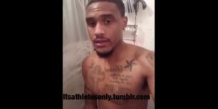 Black thug stroking his huge cock in the shower