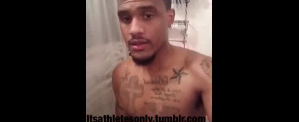 Black thug stroking his huge cock in the shower