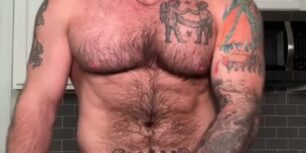 Handsome hairy stud rubbing his delicious cock in the kitchen