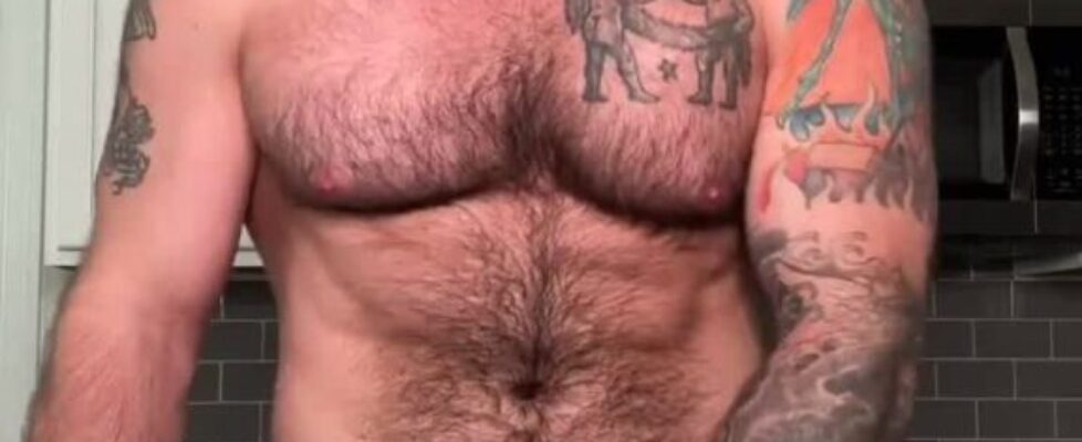 Handsome hairy stud rubbing his delicious cock in the kitchen