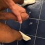 Long uncut cock shooting a huge load in a public toilet