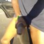 Horny black exhibitionist masturbates in the middle of the street