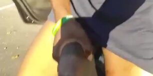 Horny black guy showing his huge cock on the street