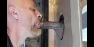 White dude sucking a huge dominican cock thru a glory hole