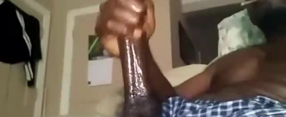 Rubbing my huge piece of oiled black cock