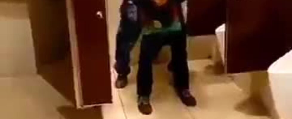 Two horny young latinos fucking in a public bathroom