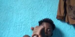 Young haitian dude rubbing his long horse cock