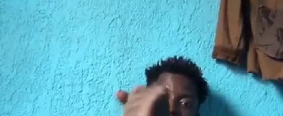 Young haitian dude rubbing his long horse cock