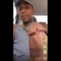 Horny black slapping his cock while he masturbates in his car