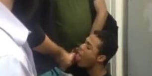 Horny sissy dude sucks a group of men's cocks in the public toilet