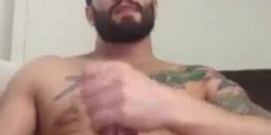 Hot bearded guy jerking off