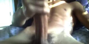 Young black rubbing his delicious oiled cock