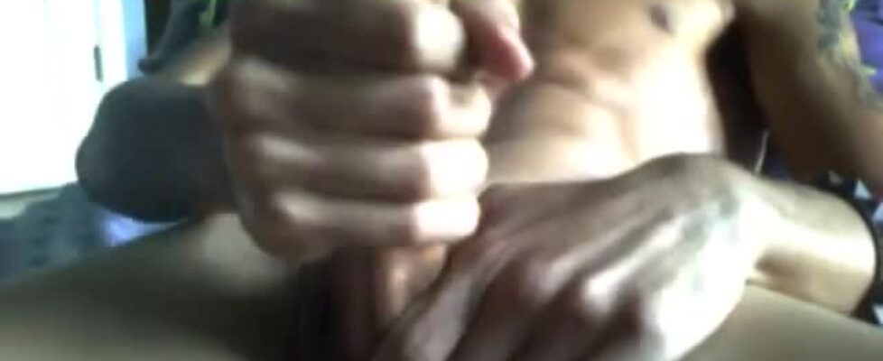 Young nigga rubbing his delicious oiled cock