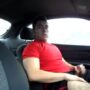 Handsome stud jerking off in the car