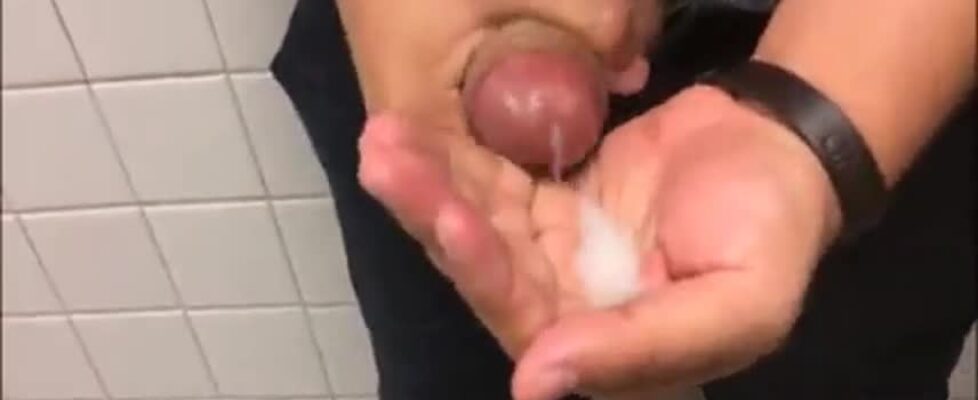 Public toilet teaser guy eats his own cum