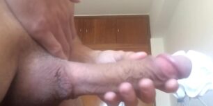 Cute daddy strokes his long pink cock