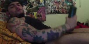 Sexy tattooed dude using his fleshlight to masturbate