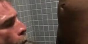 French guy sucking and fucking a huge black dude in a toilet