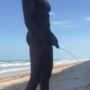 Pissing nude ath the beach