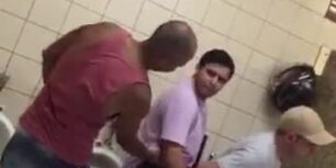 Spying on some horny guys fucking in a public toilet