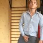 Handsome young dude having fun solo