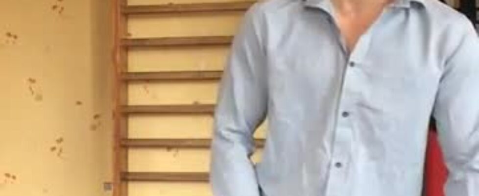 Handsome young dude having fun solo