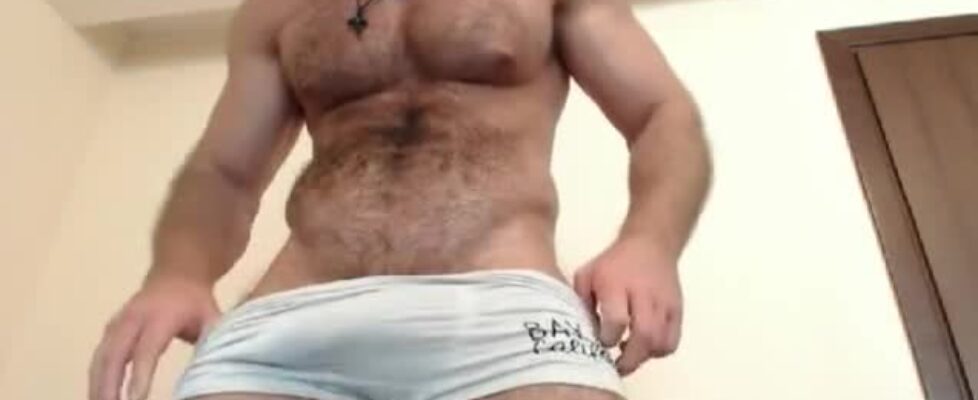 Big hairy muscle stud showing off