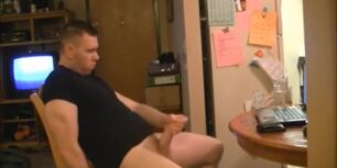 Stroking my cock while watching porn on the computer