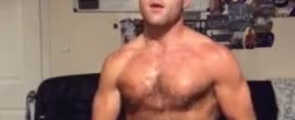 Cute dude stroking his cock in front of a webcam