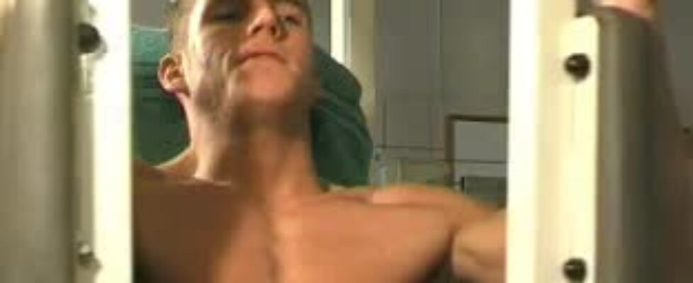 Cute young stud shows his cock and sexy body while training