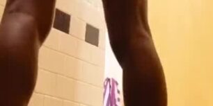Hot guy displaying his huge cock in the gym shower