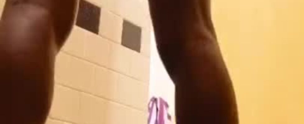 Hot guy displaying his huge cock in the gym shower