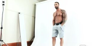 Sexy hunk latino jerking off during a photoshoot