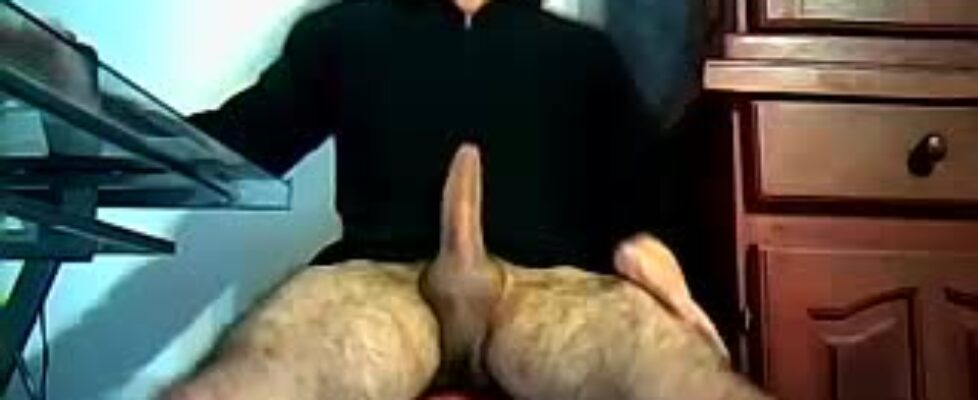 Cute young hairy twink stroking his erected cock