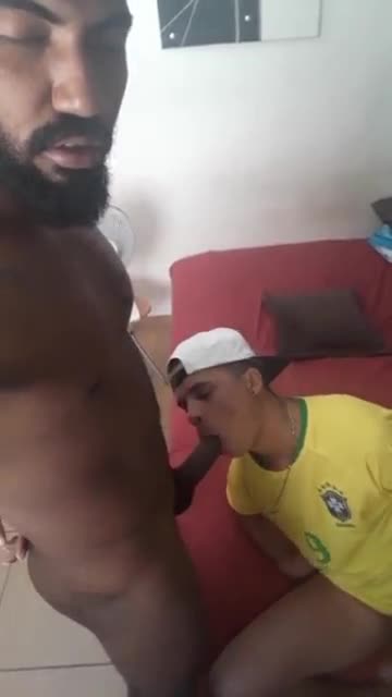 Latin thug making a young guy his bitch