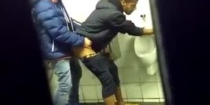 Caught to horny guys fucking in a public toilet