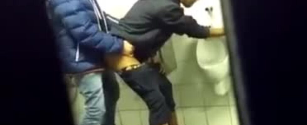 Caught to horny guys fucking in a public toilet