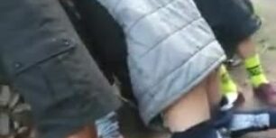 Group of friends having fun in the woods