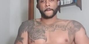 Cute tattooed light skin guy stroking his cock