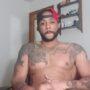 Cute tattooed light skin guy stroking his cock