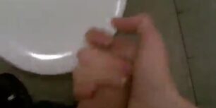 Dutch boy realising some quick stress on a school toilet