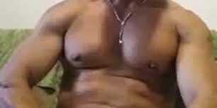Well-groomed muscular mature man masturbates solo